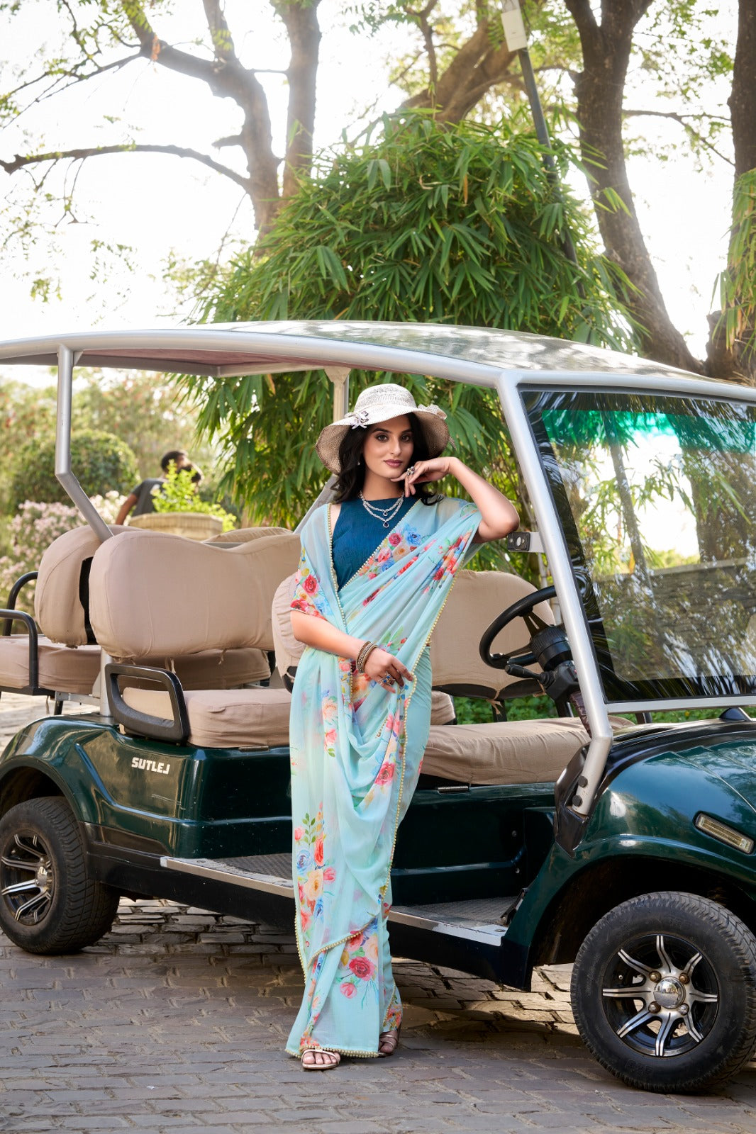 Weightless charm, pearled grace Saree