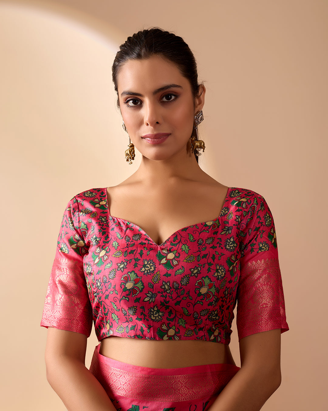 Soft Lichi Silk Saree enriched with vibrant floral digital prints and a beautifully woven zari border