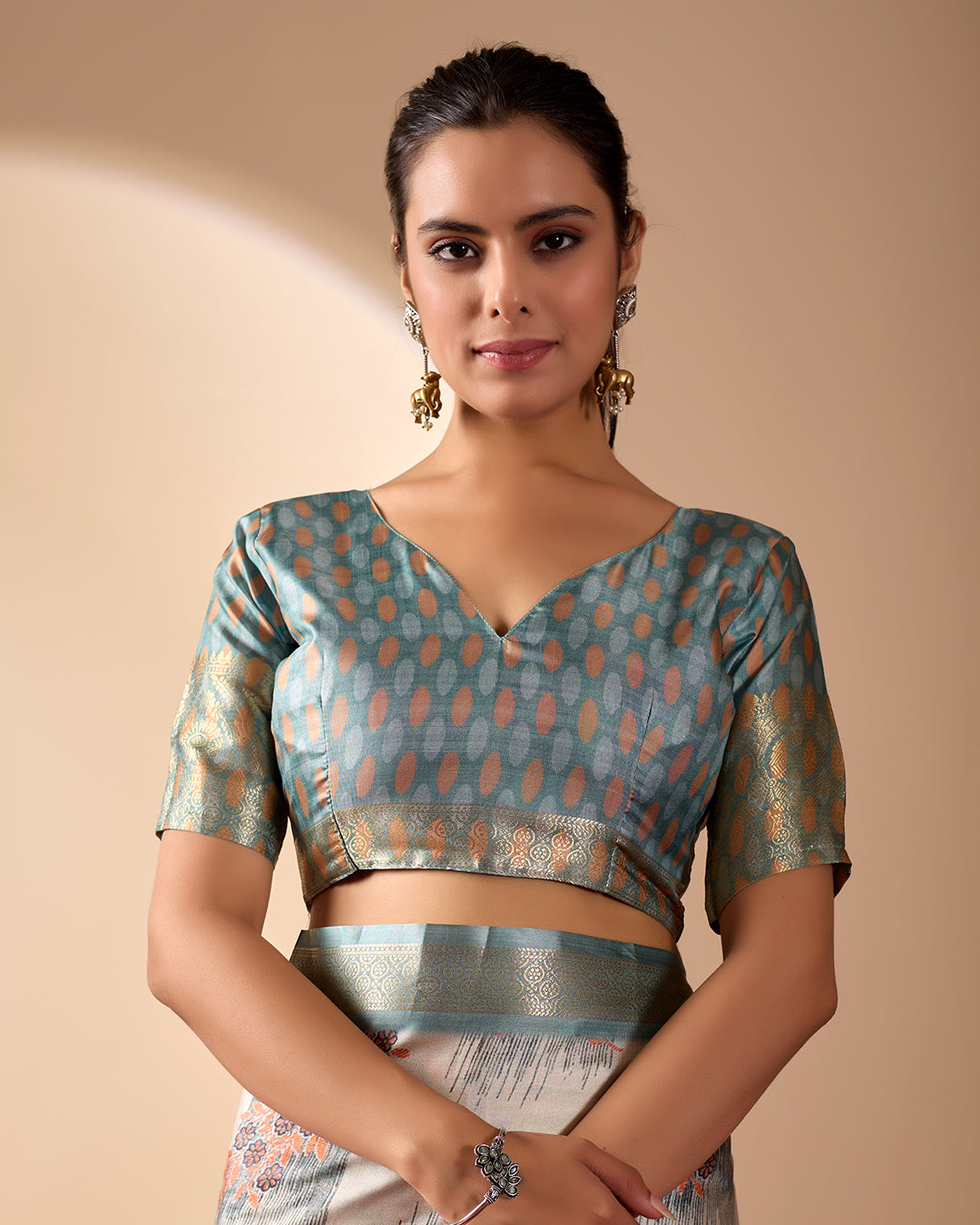 Elegant Soft Lichi Silk Saree in a refined ivory and teal tone, featuring traditional motifs and intricate digital prints enhanced with a golden zari border