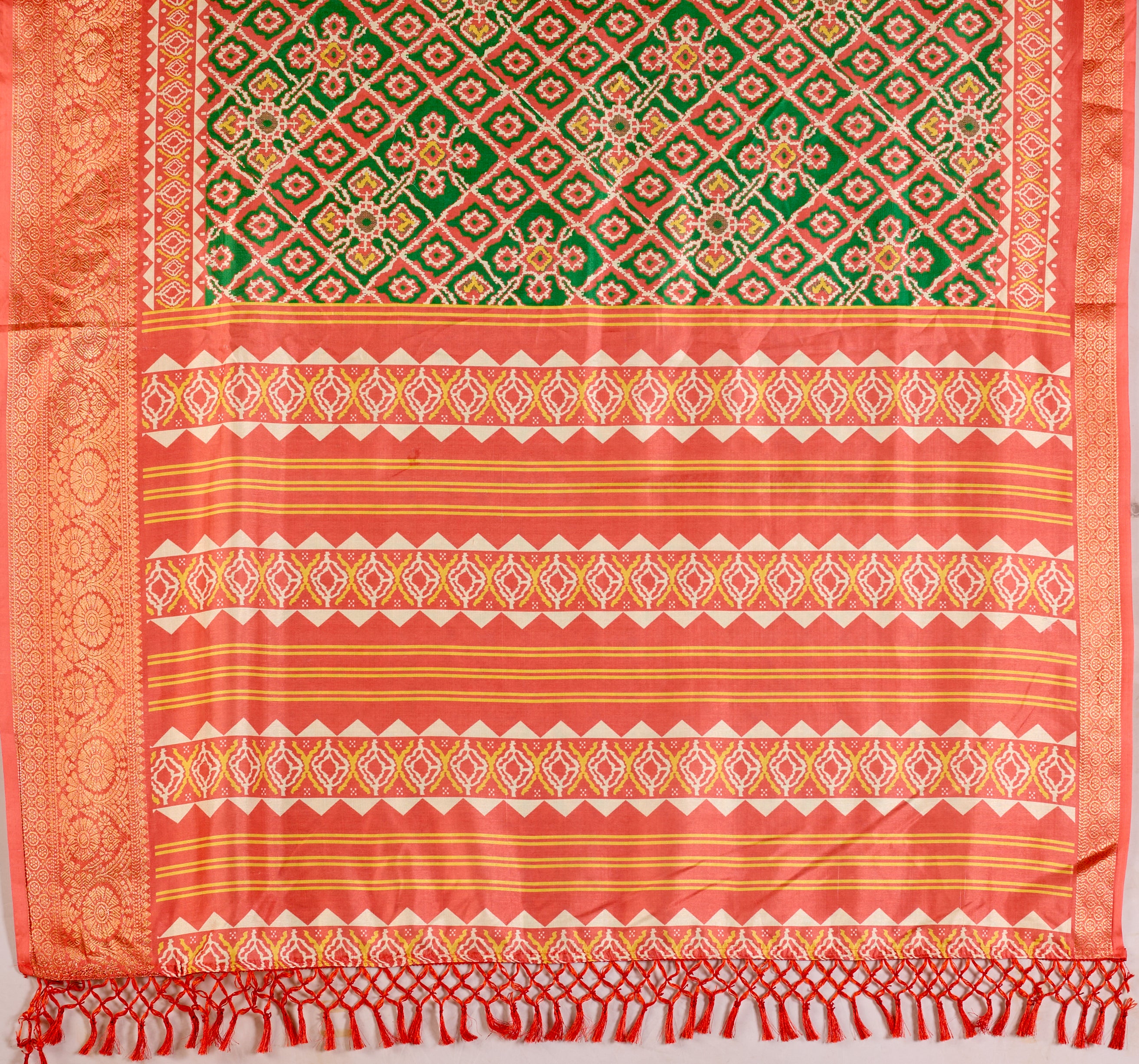 Soft Lichi Silk Saree with Exquisite Patola-Inspired Geometric Print and a Lavish Zari Woven Border