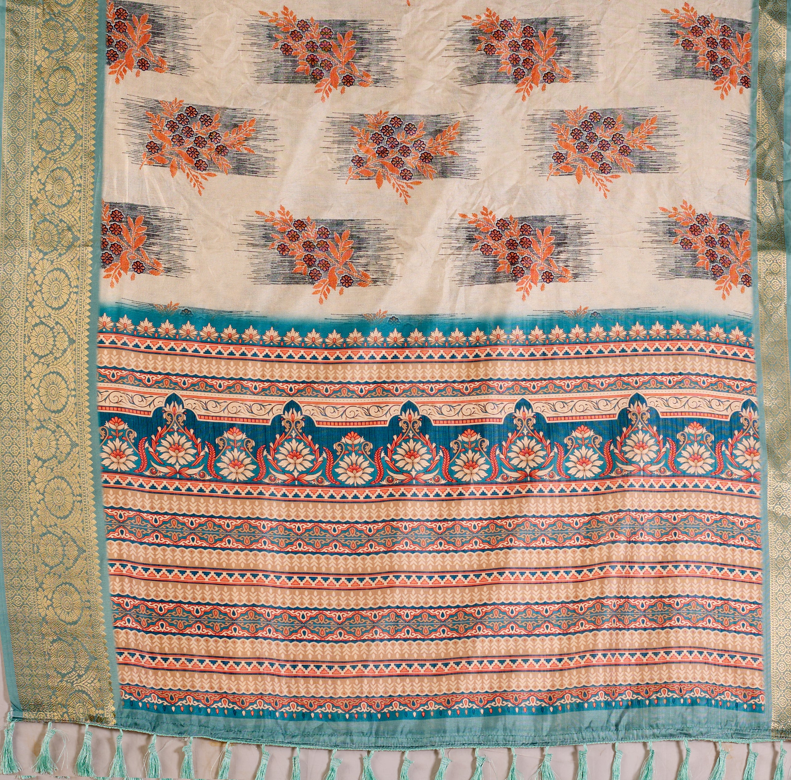 Elegant Soft Lichi Silk Saree in a refined ivory and teal tone, featuring traditional motifs and intricate digital prints enhanced with a golden zari border