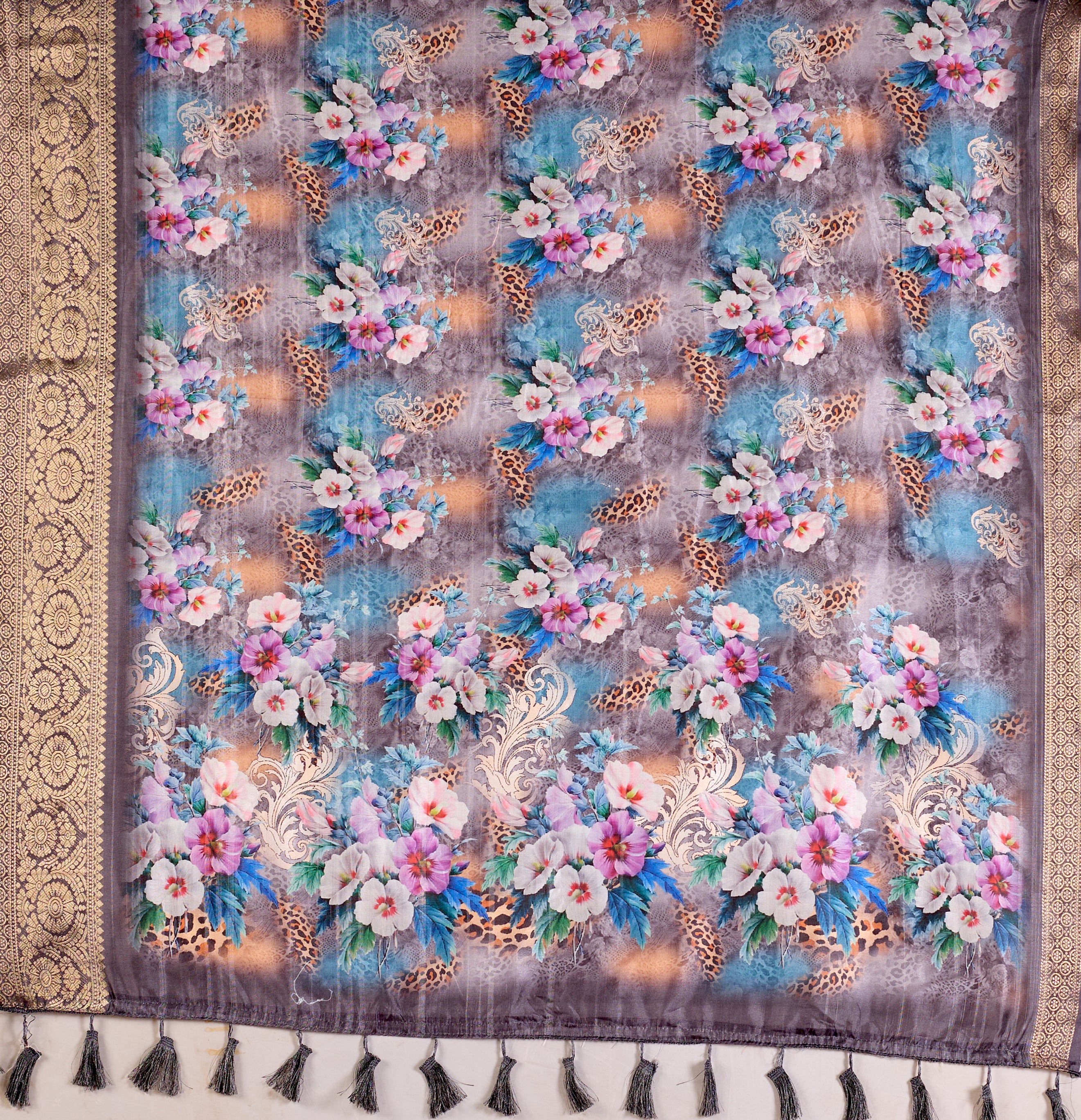 Gorgeous Soft Lichi Silk Saree featuring enchanting digital floral prints on a rich smoky grey base with an intricate golden zari border