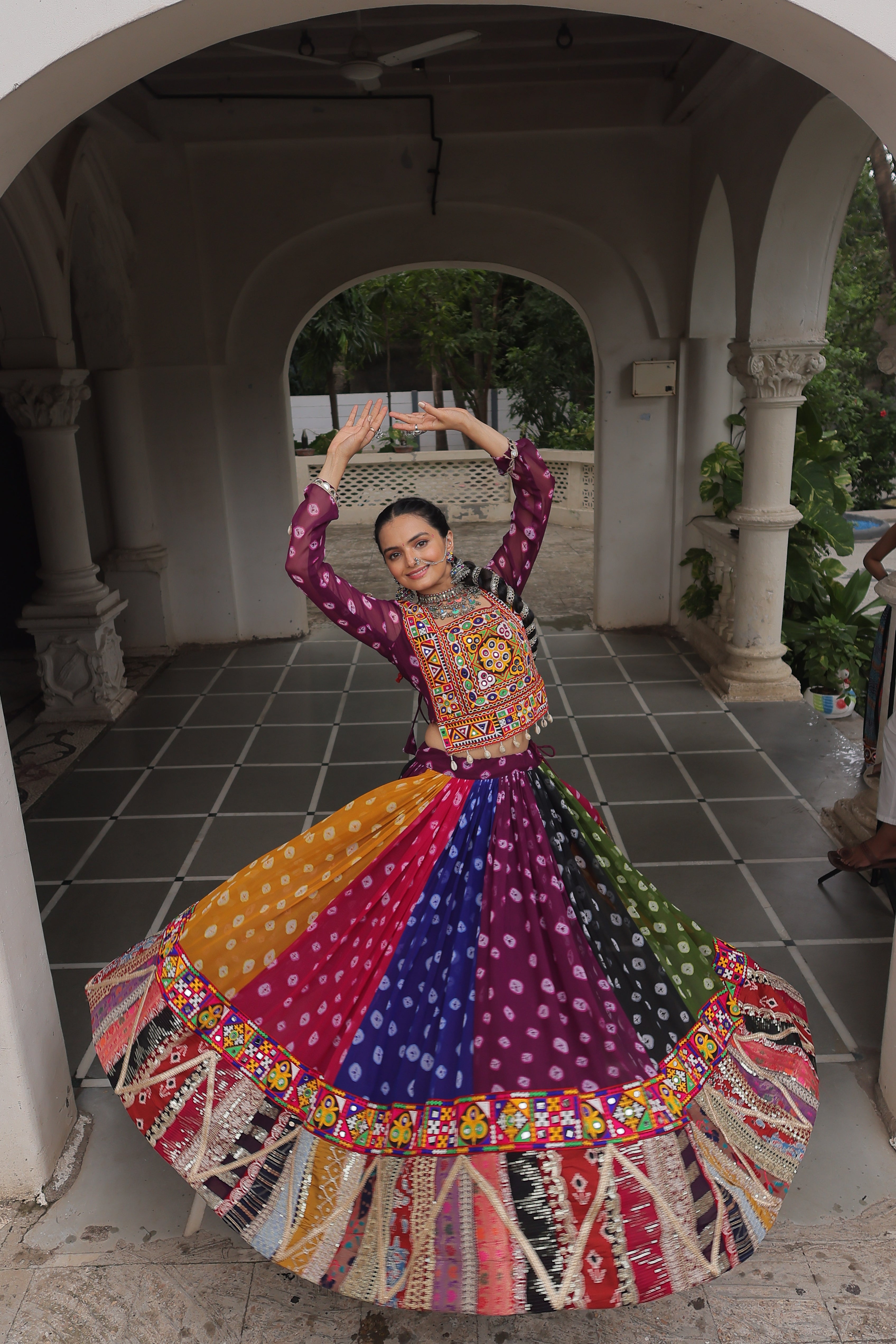 Raangilo Bandhani Mirrorwork Navratna Lehenga