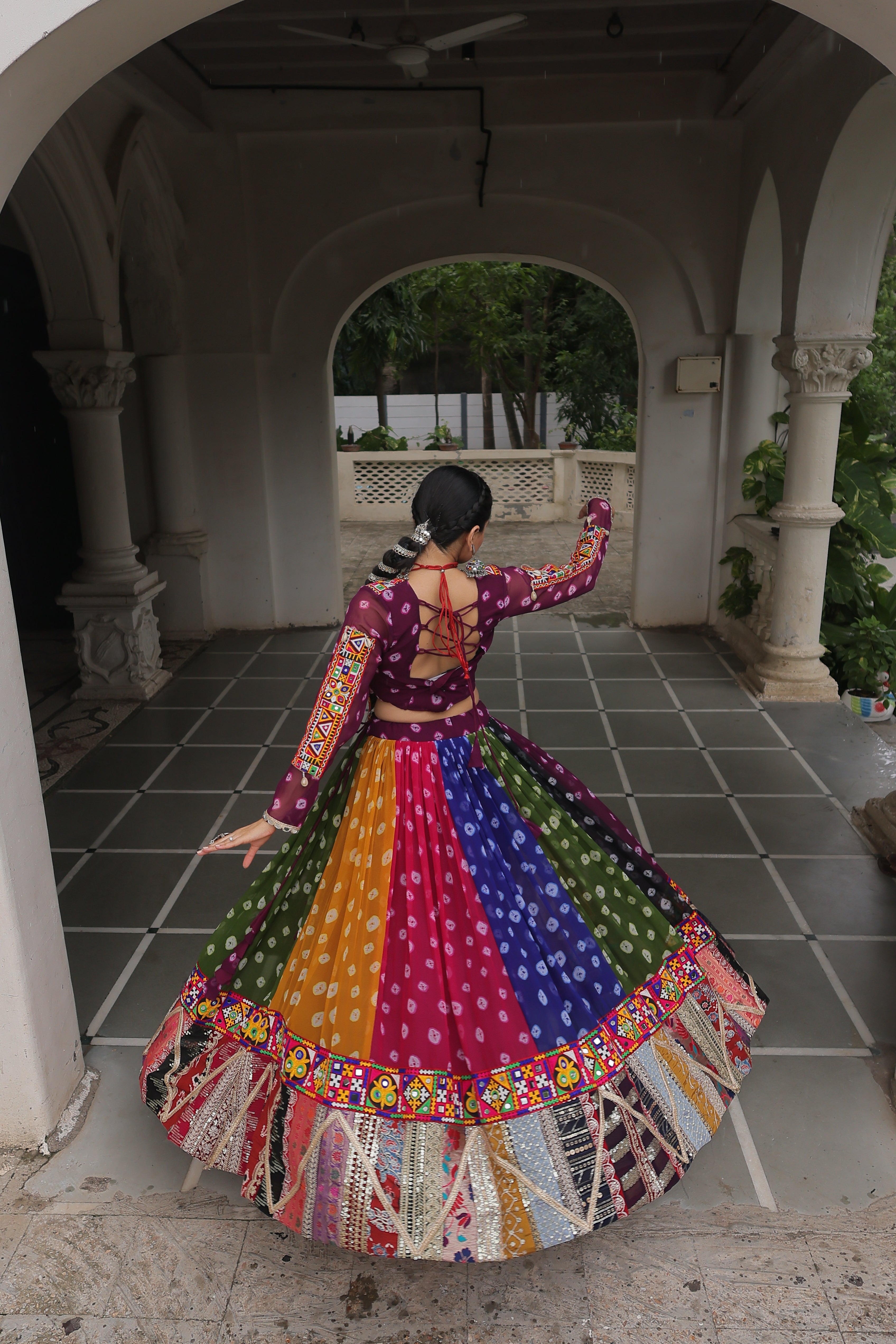 Raangilo Bandhani Mirrorwork Navratna Lehenga
