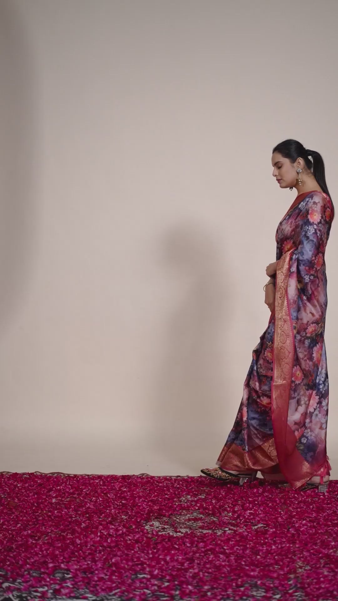 Luxurious Soft Lichi Silk Saree in Deep Wine Rose Shade featuring enchanting floral digital prints and complemented by a rich woven zari border