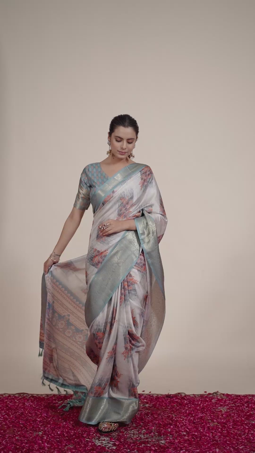 Elegant Soft Lichi Silk Saree in a refined ivory and teal tone, featuring traditional motifs and intricate digital prints enhanced with a golden zari border
