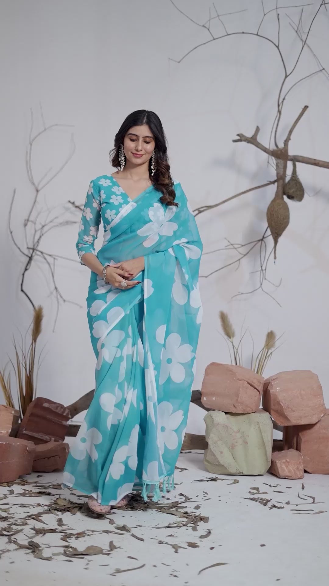 Soft Georgette Saree in Aqua Blue Shade Beautified with Bold White Oversized Floral Digital Print