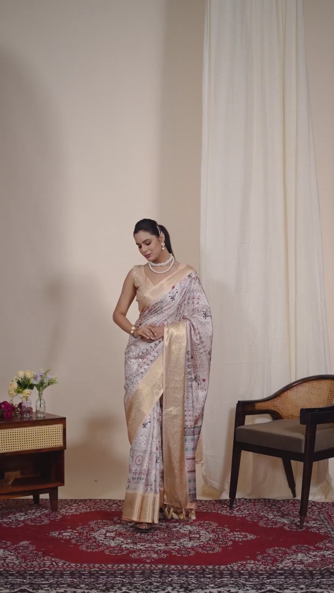 Soft Lichi Silk Saree adorned with graceful ethnic digital prints and complemented by a luxurious golden zari woven border
