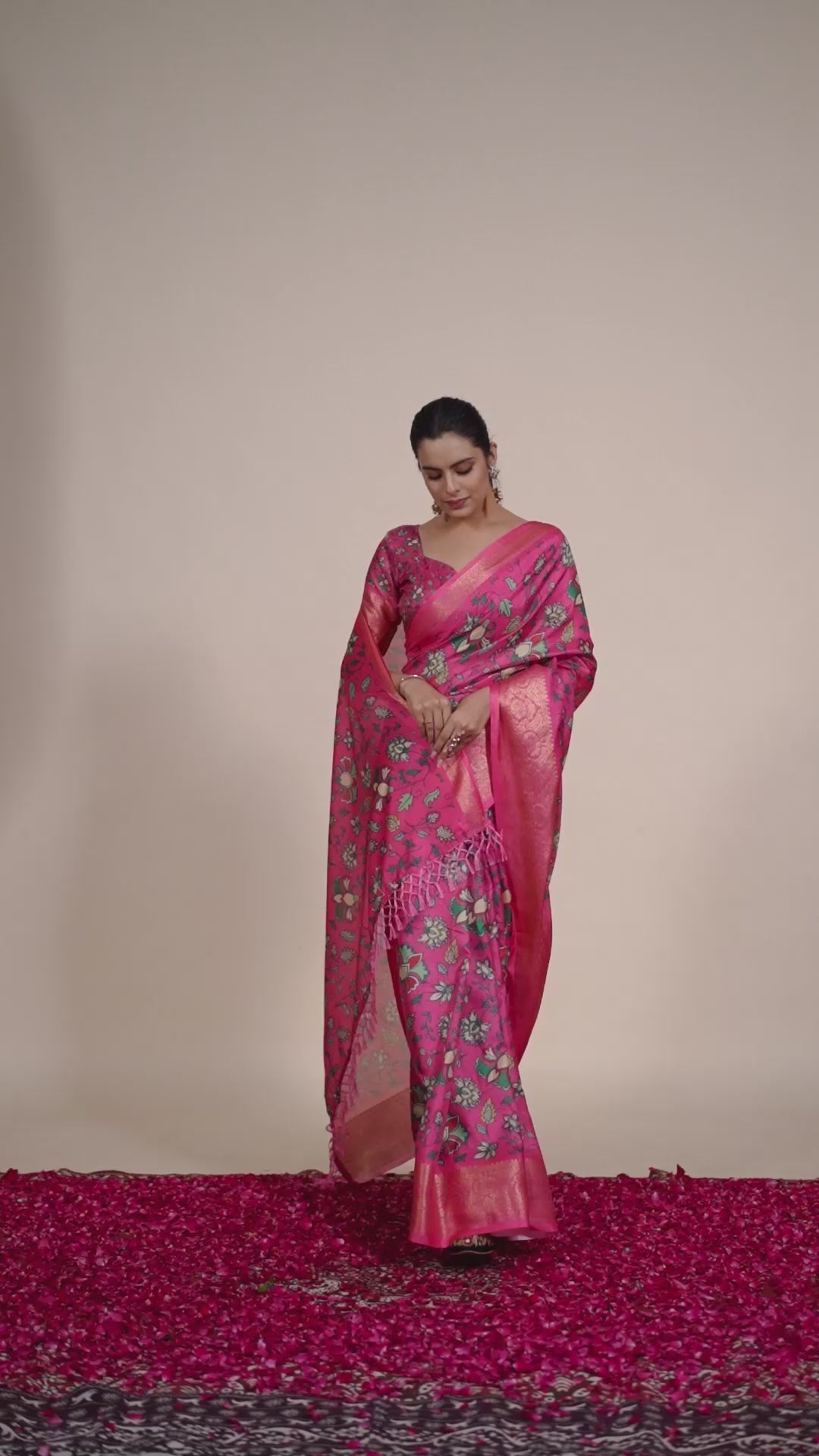 Soft Lichi Silk Saree enriched with vibrant floral digital prints and a beautifully woven zari border