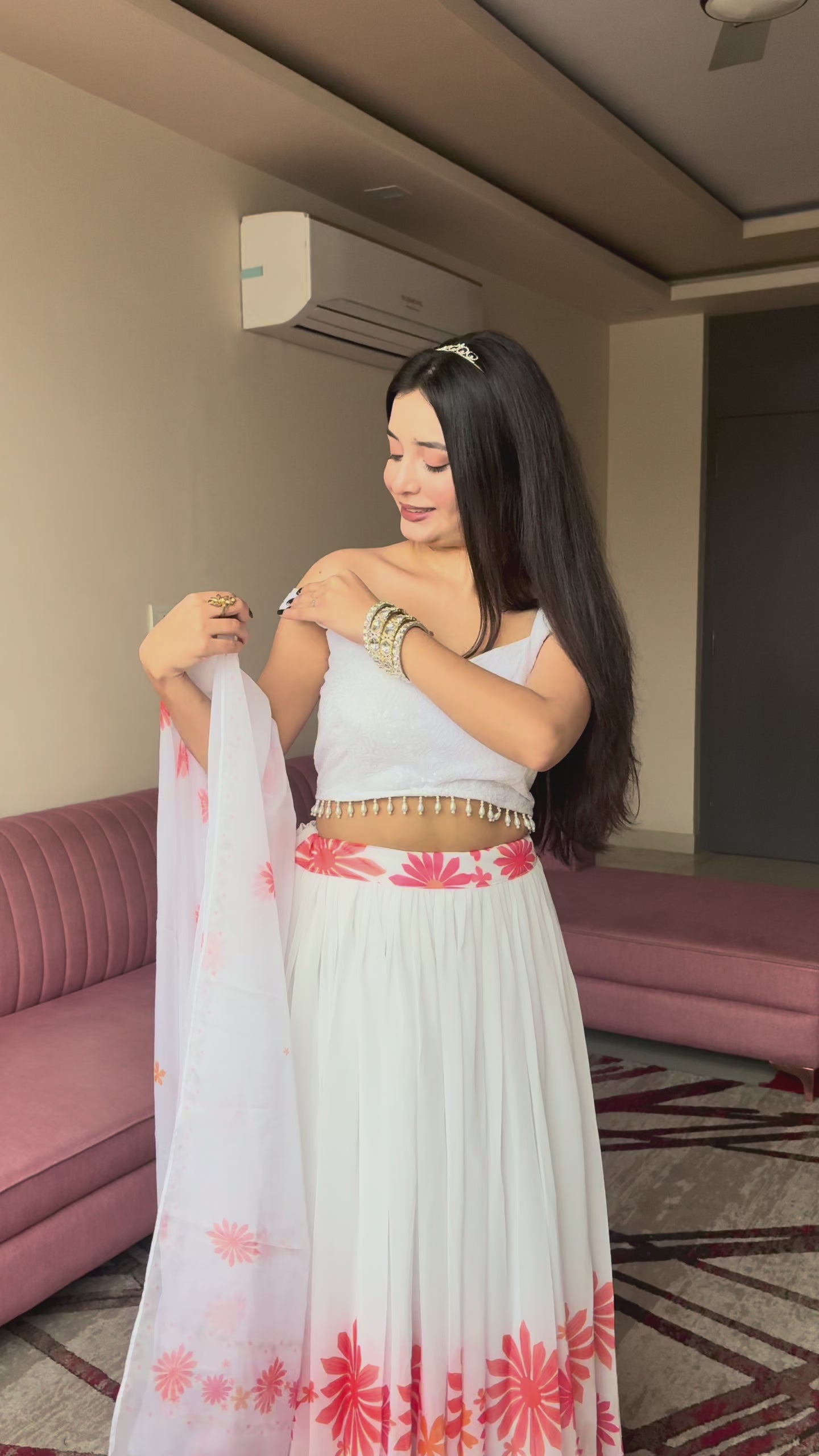 A swirl of white elegance kissed with coral floral magic